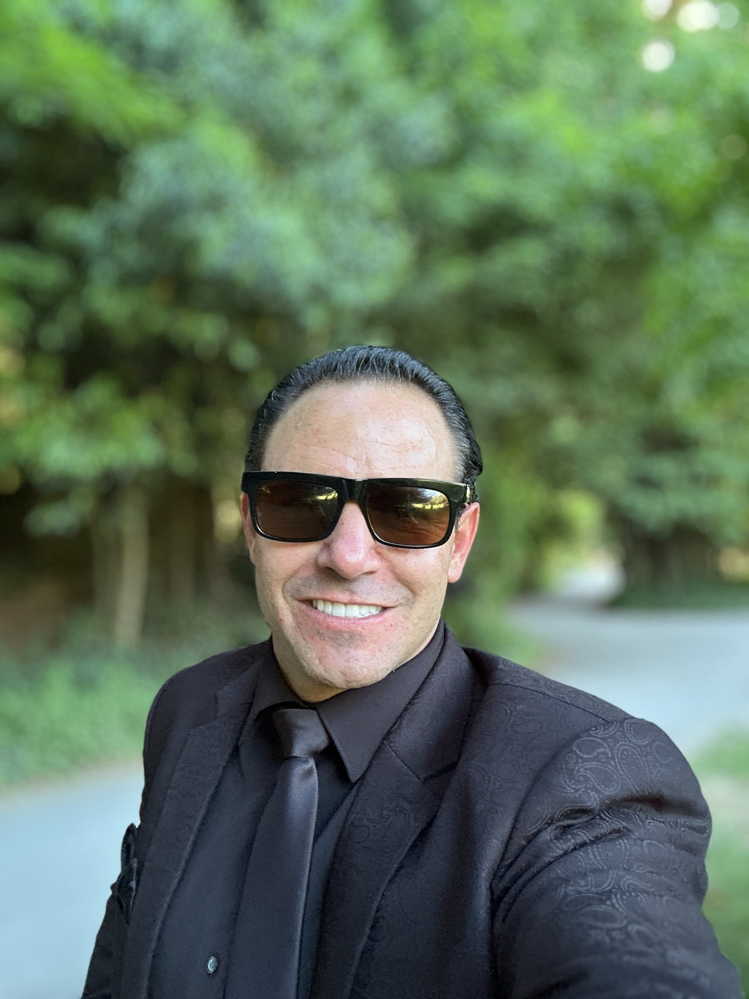 Michael Jannicelli in a black suit outdoors